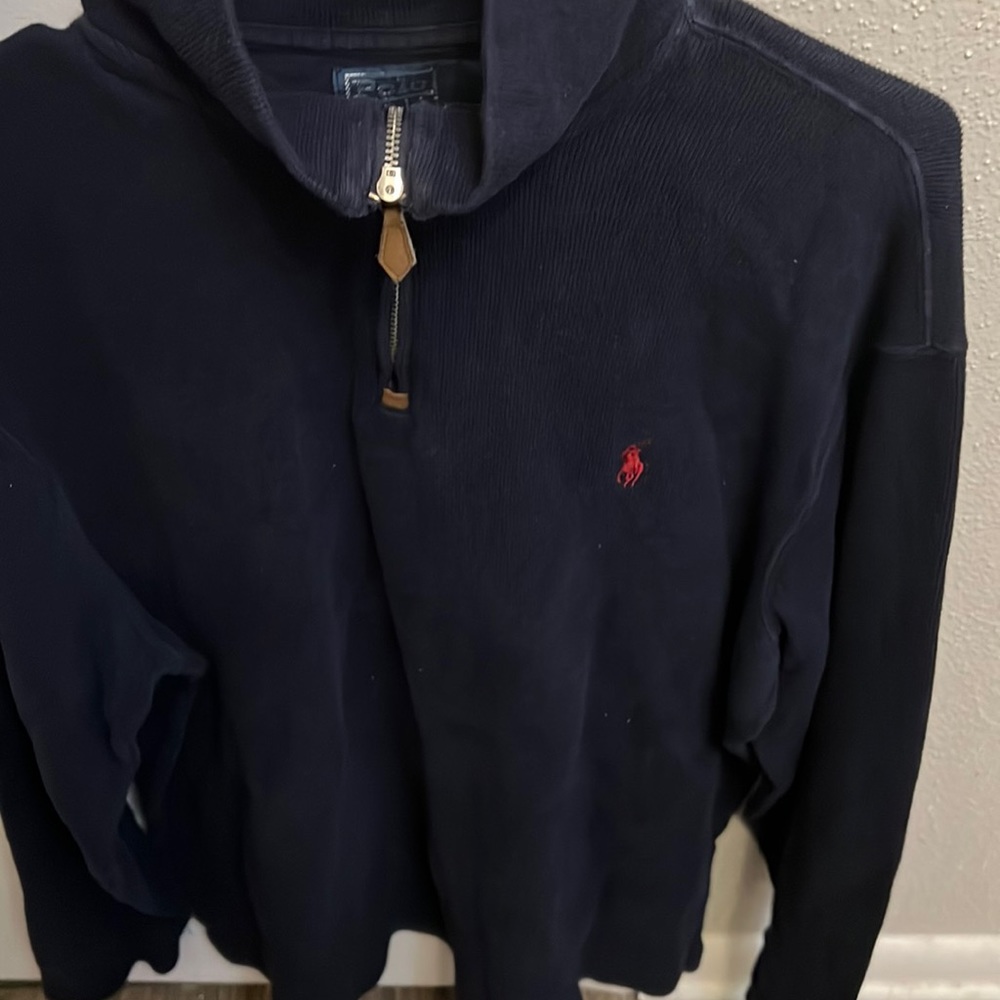 Navy blue Polo fleece with leather zipper. Red polo horse. Very good condition